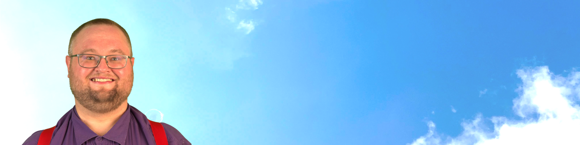 Headshot of Don with a cloudy blue sky background 1920x480a Headshot of Don with a cloudy blue sky background 1920x480a